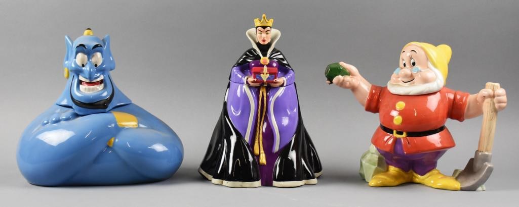 Disney Treasure Craft Character Figural Cookie Jars: These are three great cookie jars for Disney characters. These figures are Snow White's Doc, Snow White's Evil Queen, both by Treasure Craft and Aladdin's Genie, unknown manufacturer. All are approx.