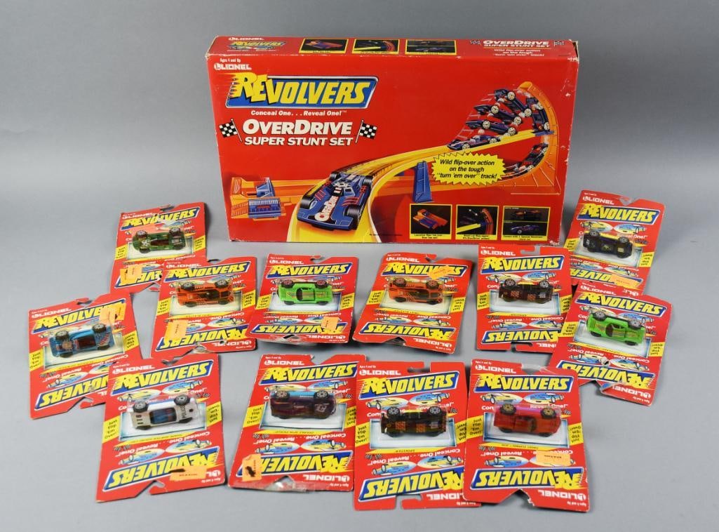(13) 1989 Lionel Revolvers Cars and Stunt Set MIP NOS: Lot is 13 1989 Lionel Revolvers Cars and Stunt Set,?MIP NOS. Includes 12 Conceal One.....Reveal One cars and an Overdrive Super Stunt Set. Single owner collection from the largest toy collector on