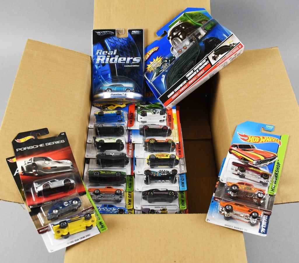 (52) 2000s Mattel Hot Wheels Basic Assortment MOC NOS: Lot is for 52 Mattel Hot Wheels from the 2000s. Counted but unchecked, basic assortment.?Single owner collection from the largest toy collector on the West Coast.