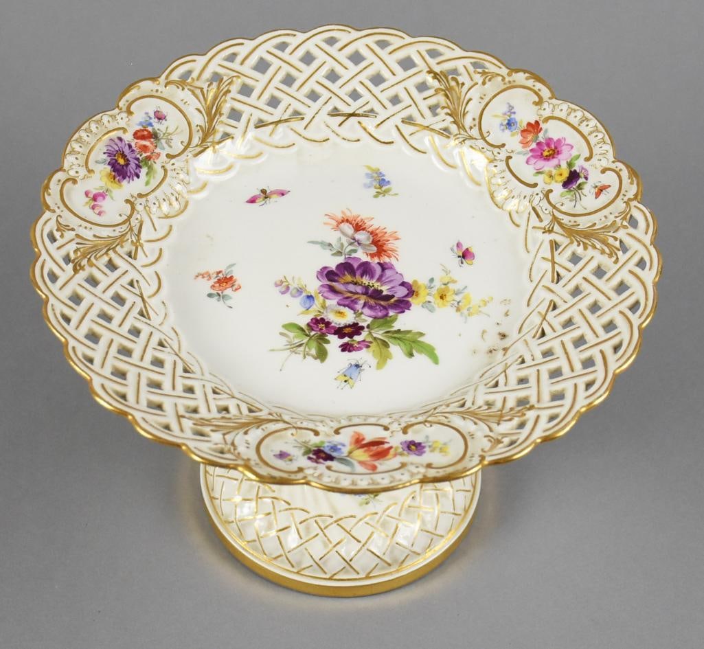 19th Century Meissen Porcelain Pedestal Dish, Hand Painted: This wonderful piece appears to be a Meissen piece from 1815-1924 judging by the mark. White porcelain with hand painted floral center, reticulated rim with hand painted floral medallions. Base is att