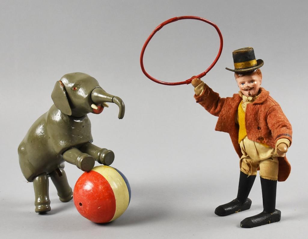 c1910 Schoenhut Humpty Dumpty Circus Ring Master & Elephant: Fun lot of Schoenhut pieces for the Humpty Dumpty Circus. Here you have the Ring Master with a hoop. He appears to have a composition head and wooden body. Jacket and vest are felt with what appears t