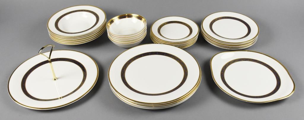1974-2001 Royal Doulton Harlow Porcelain China: Beautiful and simple but elegant Royal Doulton porcelain china. The pattern is Harlow introduced in 1974 and discontinued in 2001. White plates with cobalt center ring with flowers and gold with a nar