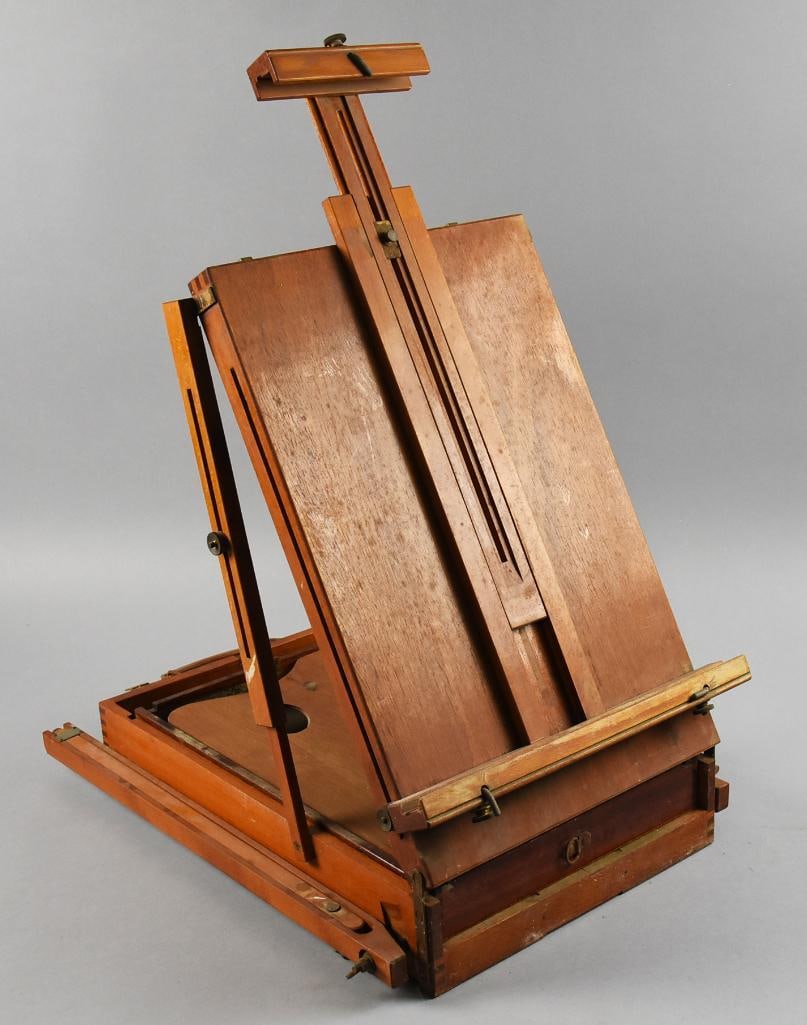 Vintage Sketchbox Easel Painting Box: This is a very nice vintage sketchbox. Easel style with inner storage for paint and supplies. Dovetail construction, inner palate, and brass hardware. It does have a mark, very light, but appears to b