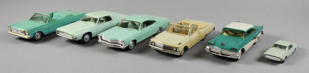 1960s Ford Dealer Promo Cars: This is a great assortment of Ford dealer promotional cars. Two appear to be from 1965. Two have a lot of specs on the bottom telling the buyer of all the great features. One measures approx. 2" x