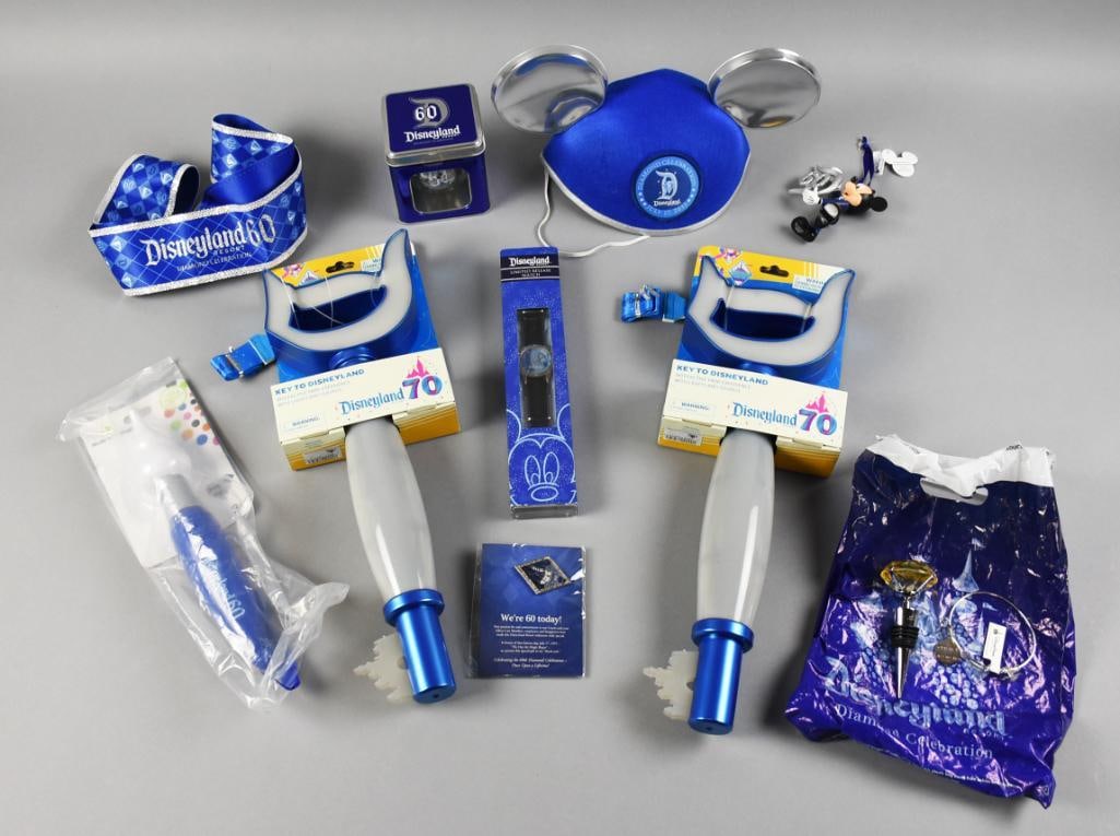 60th & 70th Disneyland Anniv. Celebration Collection MIP COA: Great lot of assorted pieces from the 60th and 70th years of Disneyland. Lots of fun things that include keys, set of ears, watch, sash and more.