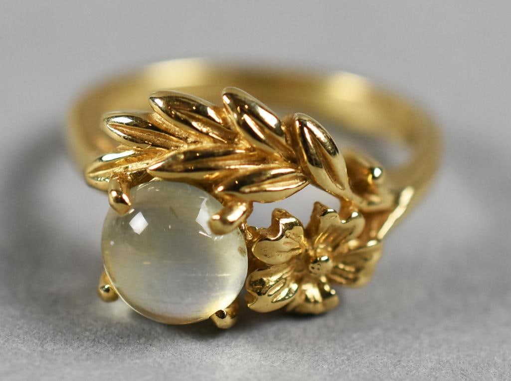 14K Yellow Gold, Labradorite Flower Ring, Signed: Darling vintage 14K yellow gold ring. Band is formed into a flower with spring of leaves and set with a labradorite cabochon stone. Designer mark is BS1 in a cartouche and stamped 14K. Ring is an