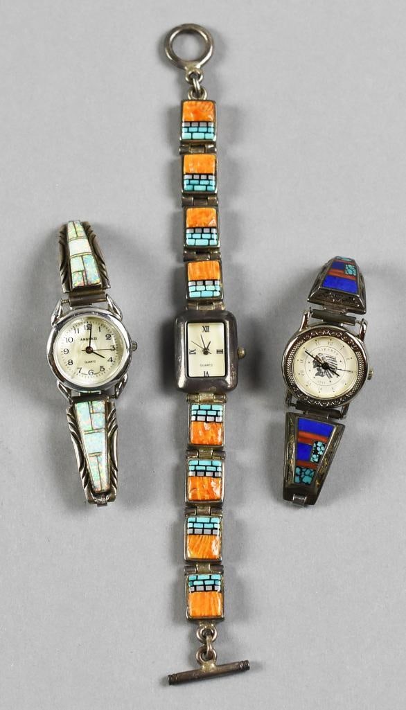 Native American Sterling Watch Bands, Watches, Lot of 3: Very pretty lot of three watches with Native American watch bands. All bands have sterling silver, each set with stones from spiny oyster to turquoise, coral and opal. One watch with the whole band,