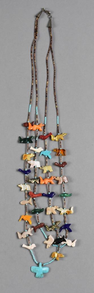 Vintage Zuni Double Strand Multi Stone Fetish Necklace: Awesome vintage fetish necklace with a variety of stones and animals. Zuni necklace is double strand with birds, bears, foxes and more, all carved in stones such as turquoise, abalone, lapis, quartz