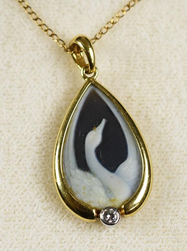 18K Gold Swan Agate & Diamond Pendant Necklace: Pretty swan teardrop pendant carved in agate with a diamond and set in 18K yellow gold. It hangs on a cable chain that is 1/20 14K gold filled. Comes in a Bluebird presentation box.