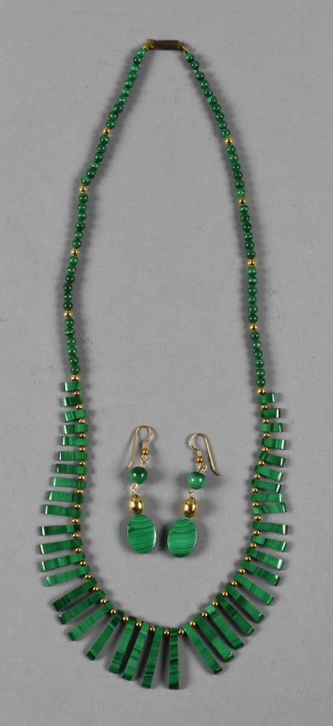 Vintage Egyptian Revival Style Malachite Necklace, Earrings: Beautiful vintage necklace in an Egyptian Revival style. Fringe style malachite beads with gold tone bead spacers. Screw clasp with no visible designer marks. Earrings are a different style, but make