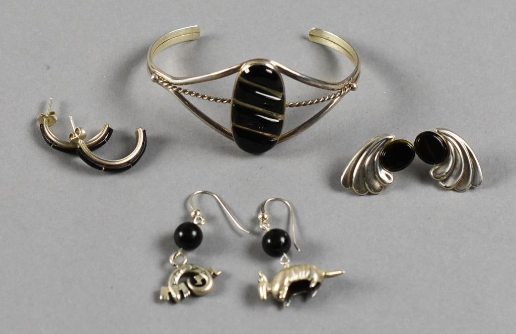 Vintage Lennie Mariano Sterling w/ Other Sterling Jewelry: This is a nice assortment of sterling jewelry with onyx. The cuff bracelet is from Navajo jewelry artist Lennie Mariano. Lot will come with three pair of earrings, all sterling, all with onyx to