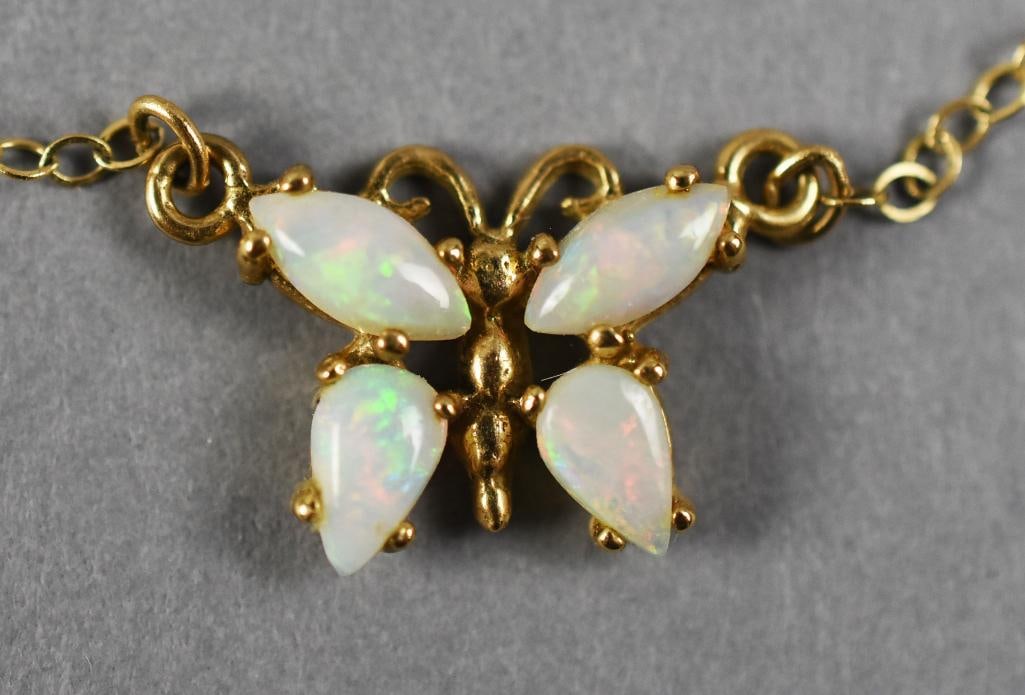 Vintage 14K Gold Opal Necklace, Pearl Bracelet: Pretty 14K gold and opal butterfly pendant on a 14K gold chain, marked on the clasp. Bracelet is solid pearl with ornate gold filled clasp. No visible marks.