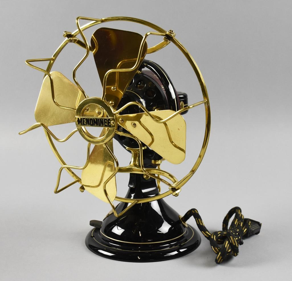 c1915 Menominee Electric Mfg. Co. Table Fan - Restored: Wonderful antique Menominee Electric Mfg. Co. table fan. It is a c1915 fan with brass blades and cage with solid cast motor and base. Base with black enamel and hand painted gold scroll details,