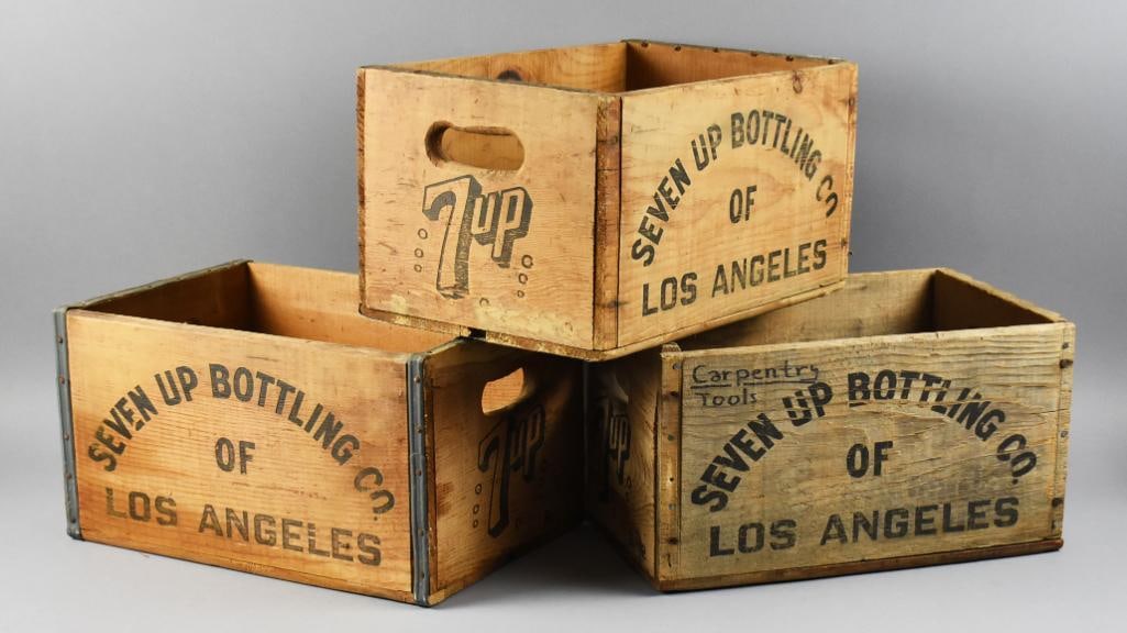 1972 7-Up Seven Up Wooden Crates: Very nice vintage 7-Up crates. Solid wood with steel braces and all are from the Seven Up Bottling Company of Los Angeles. Each with a 7Up logo on both ends with dates indicating they are from June