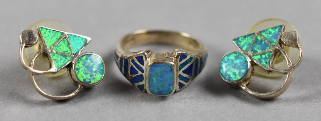 David Freeland Jr. Native American Opal Ring, Earrings: Beautiful opal and sterling jewelry including a ring and post pierced earrings. The ring is signed DRFJR for David Freeland Jr. and is an approx. size 6. Earrings are unsigned, also in sterling.