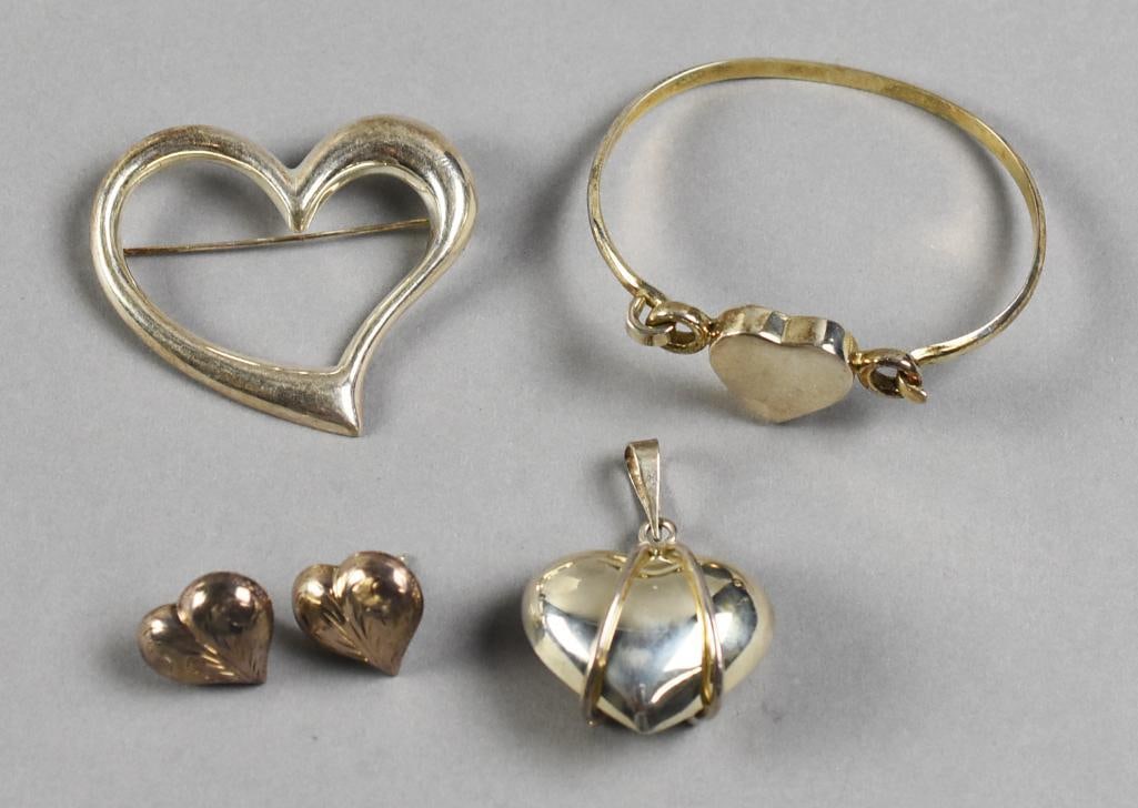 Assorted Sterling Silver Jewelry Heart Pieces: Pretty heart jewelry, all in sterling silver. Pieces include a bangle bracelet, a pair of earrings, pendant and brooch. All are marked 925, two pieces appear to have artist or designer marks. Overall