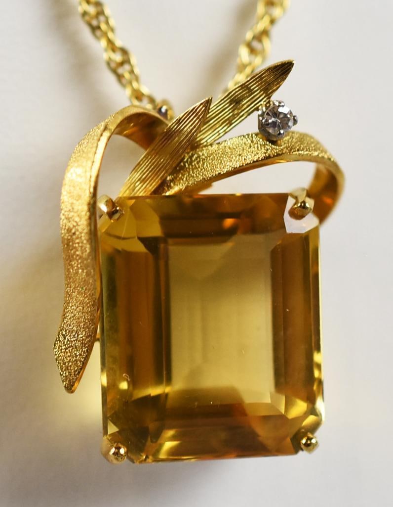 14k Gold & Golden Citrine, Emerald Cut: This is a beautiful emerald cut Citrine with a beautiful deep golden color. Citrine is 8ct+, measuring 16mm x 15mm. Citrine is set in a 16kt gold basket setting and hangs on a 14k gold chain.