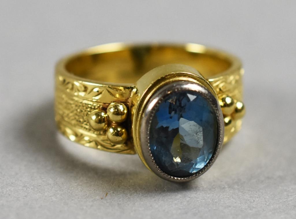 Sarosi 18K 1.63 Carat Aquamarine Ring w/ Appraisal, size 6.: This is a wonderful ring from jewelry artist Andrew Sarosi. It is 18K yellow gold band with an 8.7 x 6.7 mm, 1.63 carat oval faceted aquamarine bezel set in 18K white gold. Ring is stamped inside band