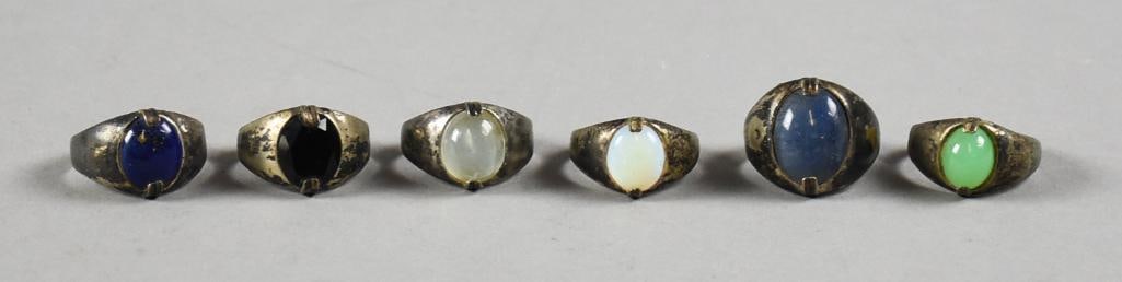 Vintage Sterling Silver and Gemstone Rings: Great looking sterling rings that are set with cabochon stones. Stones are lapis, opal, garnet and more. They are marked and all are approx. size 9.
