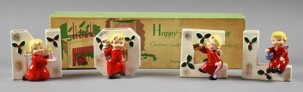 1956 Napco Happy Yuletide Quartet NOEL Figures Original Box: Wonderful set of Napco figurines (Originals by Norton). These little cuties come in their original box and spell out NOEL. Each is an angel in red and is a vase candle holder. Each are approx. 4"