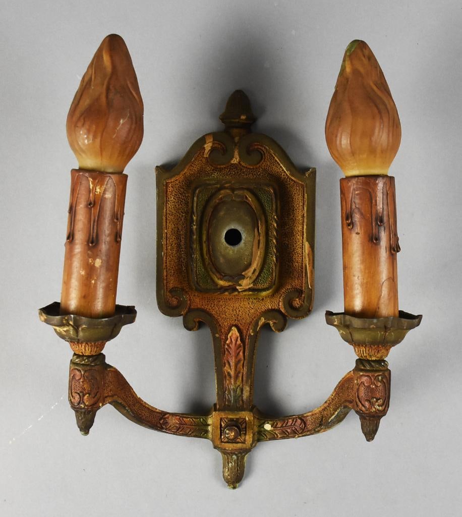 Antique Art Deco Polychrome Double Wall Sconce: This beauty is an antique Art Deco wall sconce. Polychrome painted, appears cast iron. Molded leaves and scrolls with acorn finial. Drip sleeves appear original, bulbs may be as well. Electrical box o