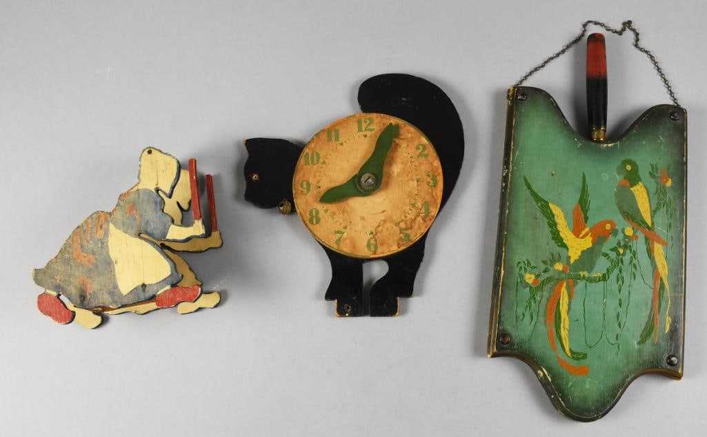 Primitive Antique Folk Art Kitchen Pieces: This fun little collection is all primitive antique kitchen folk art. They include a lady holder, a black cat wall clock - possibly a toy and a parrot painted cutting board with knife. These pieces