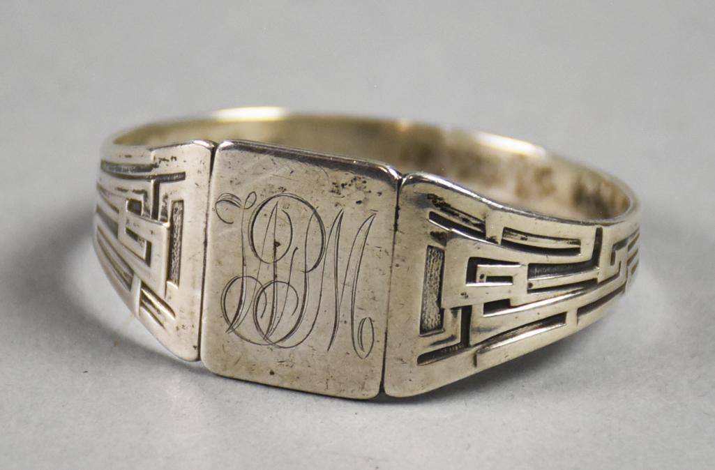 Art Deco Unger Brothers Sterling Signet Baby Bracelet: This beauty appears to be a baby bracelet. The band is adorned with Art Deco geometric shapes with a monogram WPM. It is marked Unger?Brothers sterling 925 Fine with an approx weight of 18g.