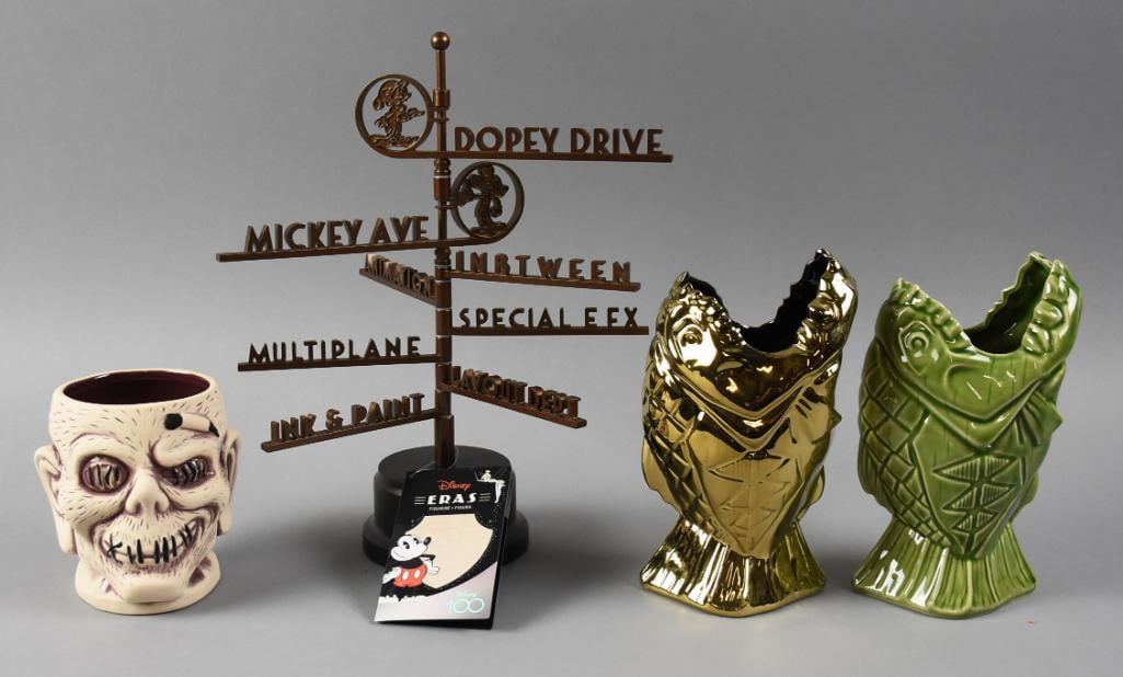 Disney and Trader Sam's Collectibles - Factory Boxes: Lot is for some fun Disney, Trader Sam's at the Disneyland resort collectibles. The Disney street sign with multiple streets such as Mickey Ave, Multiplane, Ink & Paint and others. The three Trader Sa
