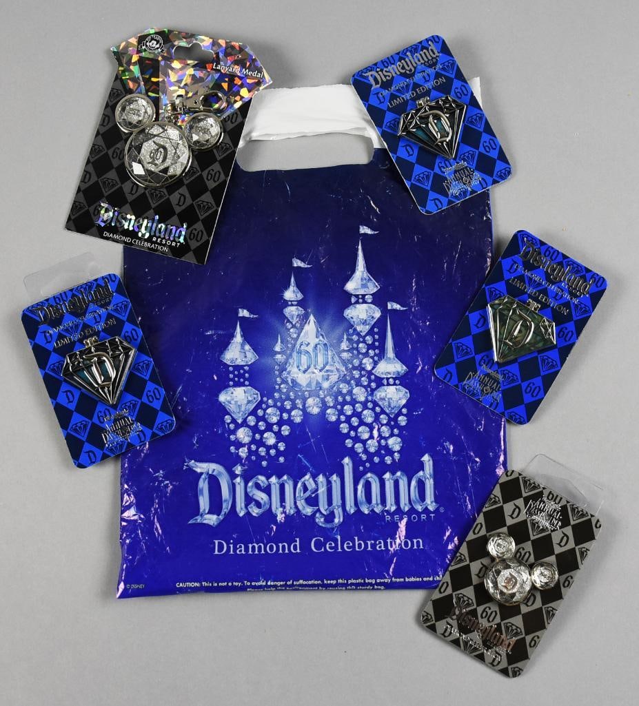 Disneyland 60th Anniversary Ltd Ed Hinged Pins & More: Cool lot of Disneyland 60th anniversary lapel pins that include three diamond shaped Mickey Mouse and two Merryweather - Sleeping Beauty, a Mickey head pin and a Mickey head lanyard. Includes a Diamon