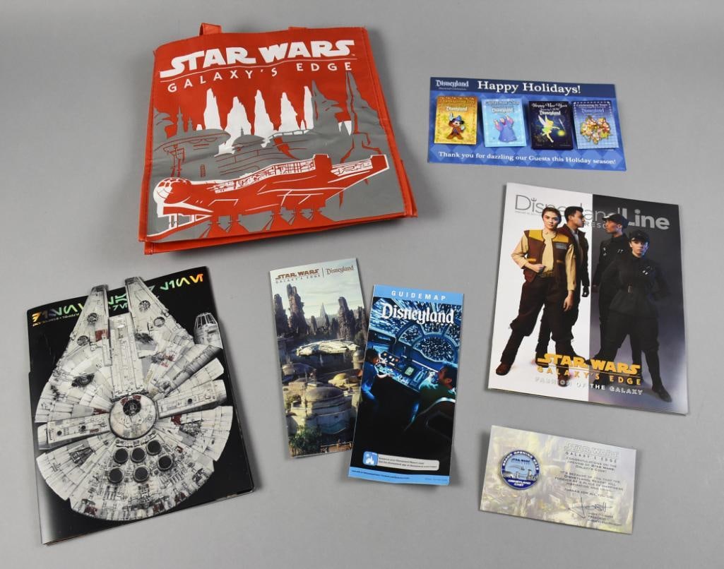 Disneyland Cast Member Assorted Items: Great Disneyland pieces only for cast members. These pieces include holiday pins on original card back, guide maps with one being for Star Wars. Other Star Wars pieces include a reusable bag, trade pi