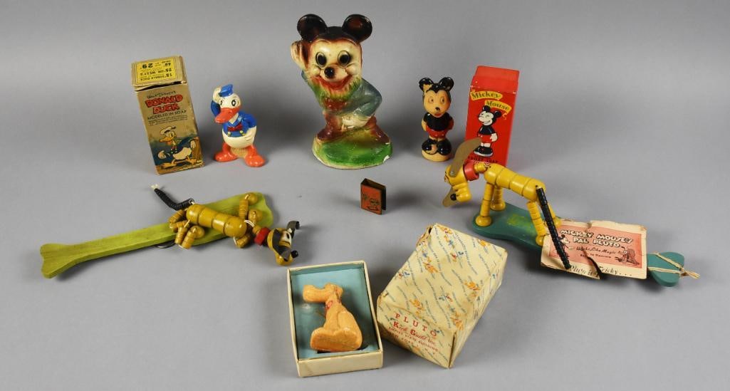 1930's-50's Vintage Disney Mickey Donald Assortment: These pieces include a 1930s Three Little Pigs matchbox holder, three molded soaps of Donald Duck, Pluto and Mickey Mouse by Cussons, all appear to be from the 1950s, a chalkware Mickey, possibly from