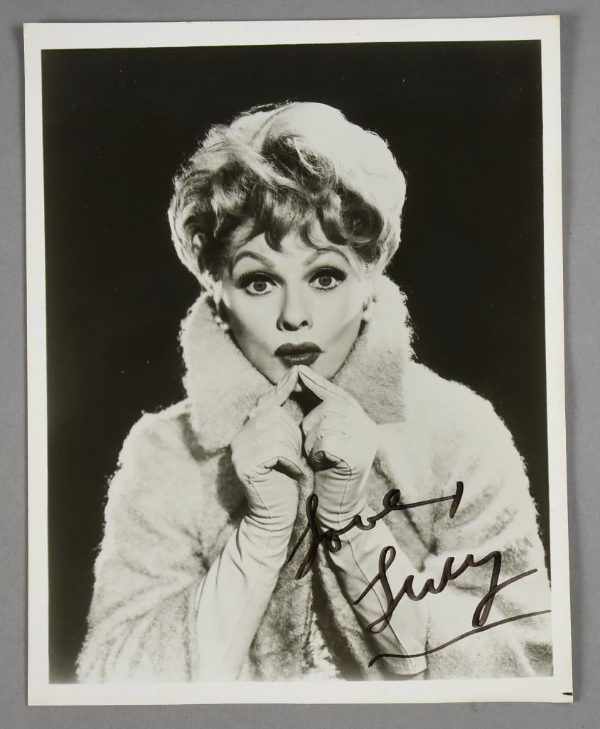 Lucille Ball Signed Black & White 8 x 10 Photograph: The beautiful Lucille Ball photo is a black and white 8" x 10" glossy. It appears to have been signed "Love Lucy" in black marker.