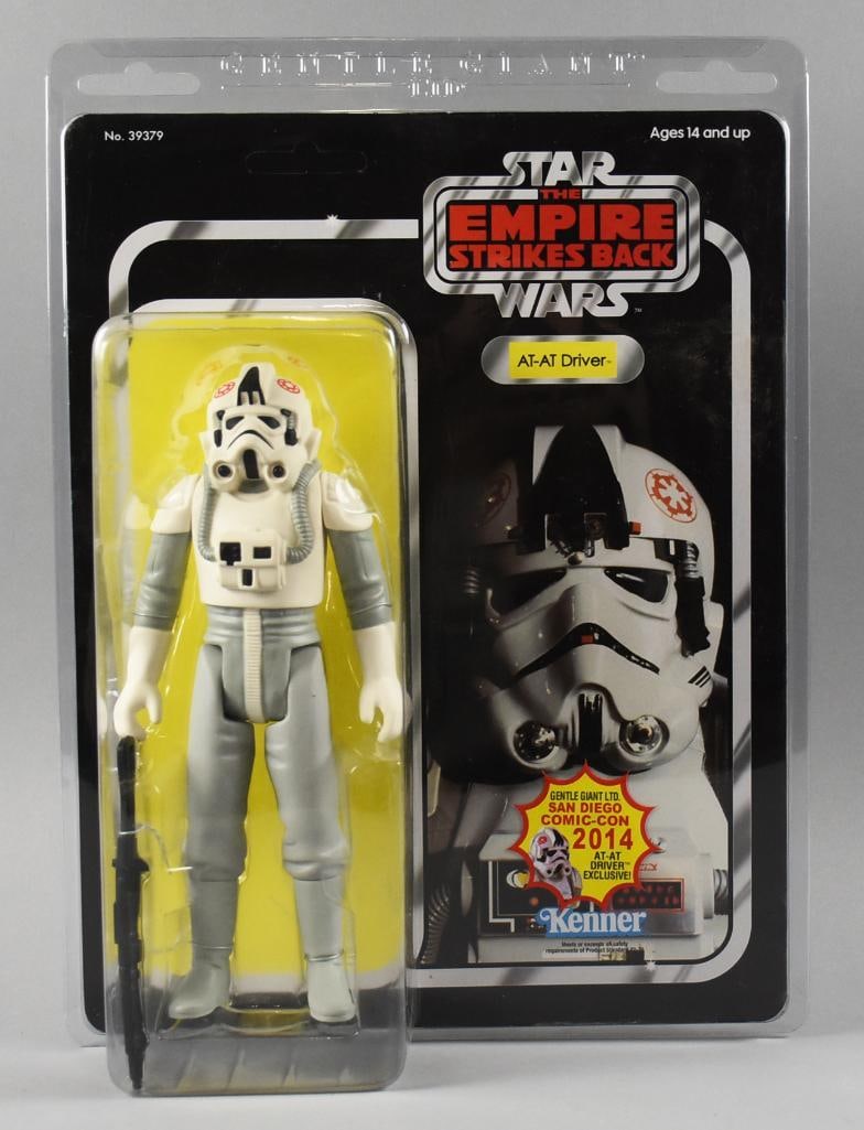 Gentle Giant San Diego Comic-Con Star Wars AT-AT Driver NOS: This lot is for a Gentle Giant, Hasbro AT-AT Driver from the 2014 San Diego Comic-Con. Packaging is original and measures 15" x 20".