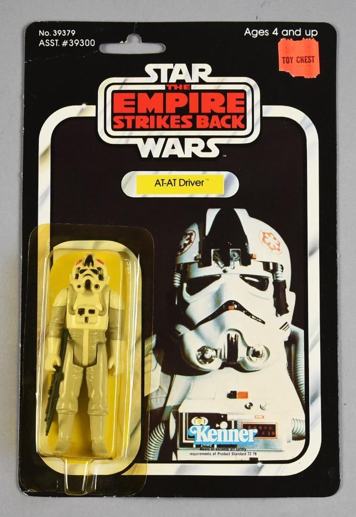 1980 Kenner Star Wars AT-AT Driver 41E Back MOC NOS: Lot is for a 1980 Star Wars AT-AT Driver action figure from Kenner. Comes in a protective case.