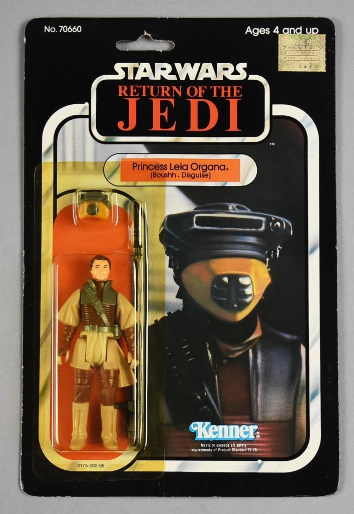 1983 Kenner Star Wars Princess Leia 77A Back MOC NOS: Lot is a 1983 Star Wars Princess Leia Organa in Boushh?Disguise. Comes in light plastic case.