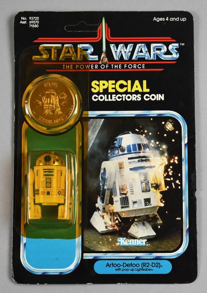 UNPUNCHED 1984 Star Wars R2 D2 POTF Coin Kenner 92A Back: Lot is for a 1984 Star Wars Power of the Force action figure of R2-D2 from Kenner. Comes in plastic protective case.