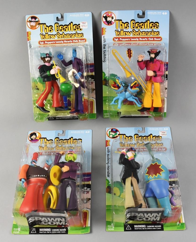 (4) McFarlane Beatles Yellow Submarine Action Figs MOC NOS: Action figures are John with the Bulldog, Paul with Sucking Monster, George with Snapping Turk and Ringo with Apple Bonker. Single owner collection from the largest toy collector on the West Coast.