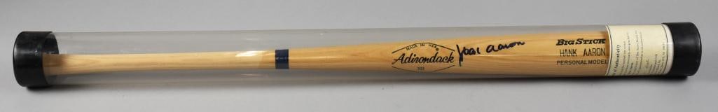 Hank Aaron Signed Personal Model Baseball Bat w/ COA: Very cool baseball bat signed by Hammerin' Hank Aaron. It is an Adirondack Big Stick and was a personal model. Includes a COA from The Score Board.