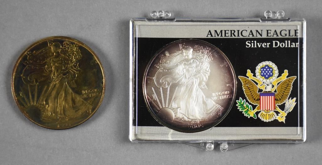 Pair American Eagles, One Oz Fine Silver: Lot is a pair of one ounce each American Eagles, one in protective case.