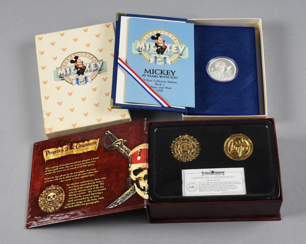 Disney 60th Anniv. Coin, Pirates of Caribbean 24K Plate Coins: Nice lot of collector coins that includes one 999 fine silver Walt Disney collectible coin commemorating the park's 60th anniversary. Also is a Pirates of the Caribbean replica coin in 24K gold plate