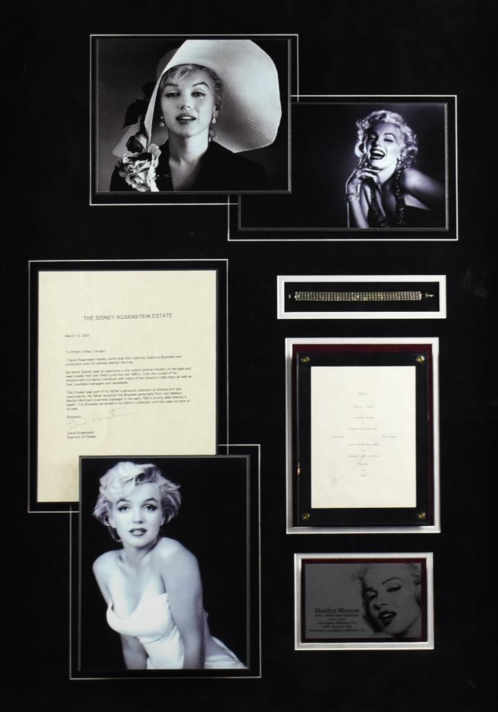 Marilyn Monroe Photos, Signed Menu, Bracelet & More, COA: This is a really fun piece of Hollywood history. This shadowbox is filled with some beautiful photos of Marilyn Monroe and includes a pretty costume jewelry "diamond" bracelet and a menu that was also