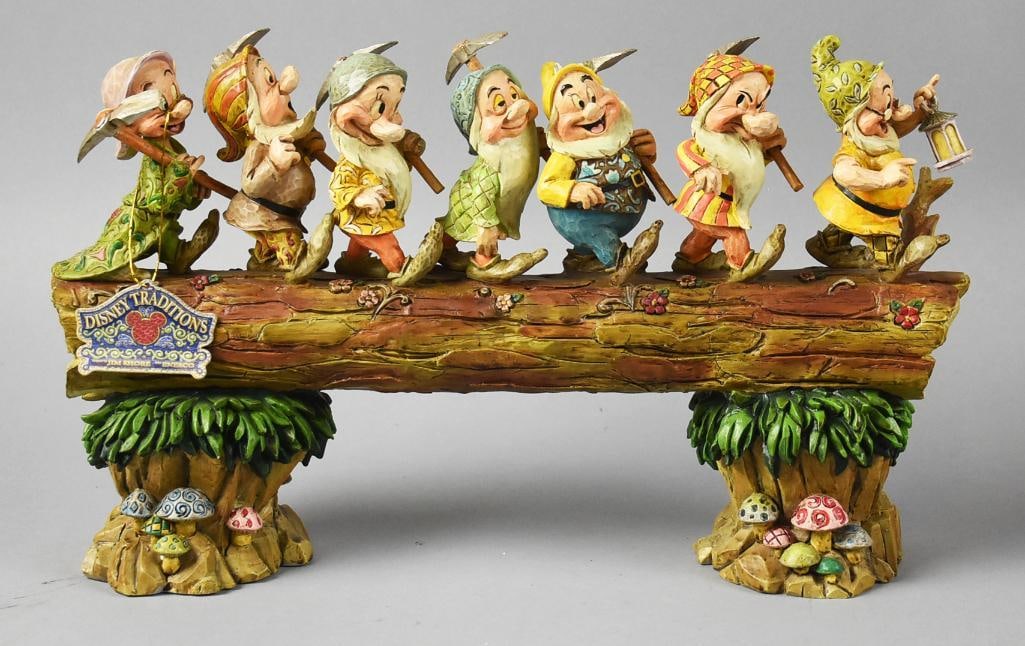 Enesco Disney Showcase Snow White's Homeward Bound MIB NOS: Darling figure from Enesco's Disney Showcase collection. This one is called Homeward Bound?and is all seven dwarfs walking across a log bridge. Comes in the original box with original factory plastic.