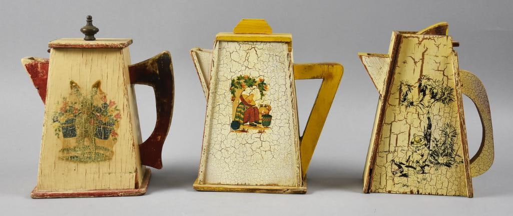Vintage Southwestern Mexican Wooden Teapots: This lot of three teapots are novelty and solid wood. They are darling and hand painted. Two with men having a siesta and one burrow with baskets of flowers that is transfer. Each is approx. 9" tall.