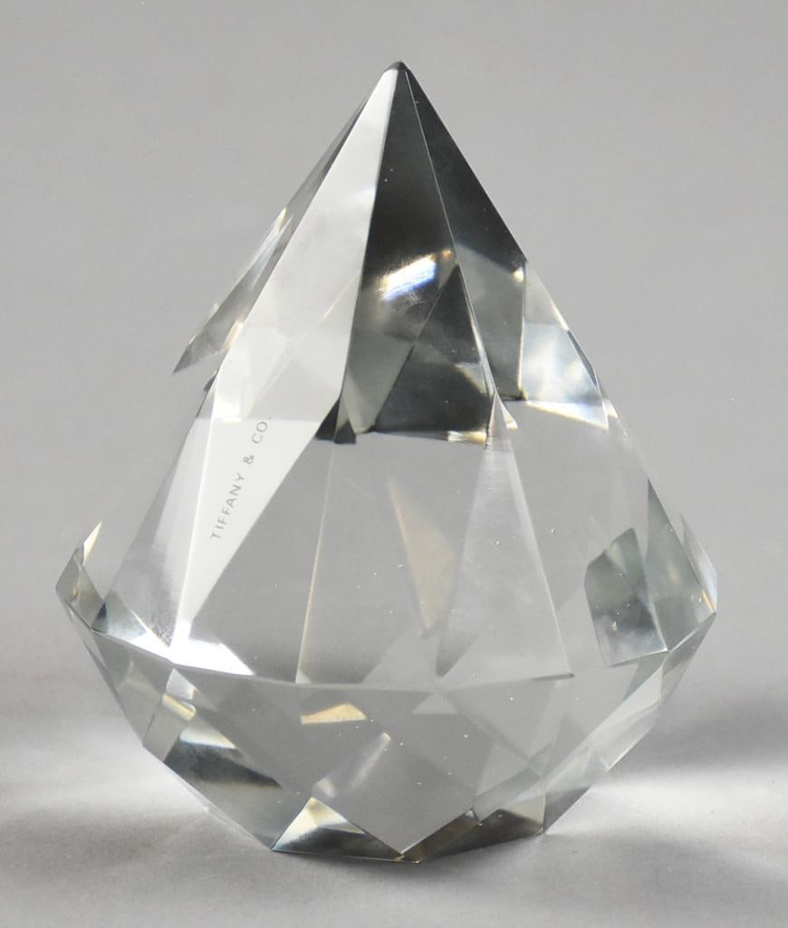 Tiffany & Co Crystal Teardrop Paperweight: Pretty mid 1990s Tiffany & Company paperweight. Faceted teardrop shape with the acid mark clearly visible. Stands approx. 4" tall.