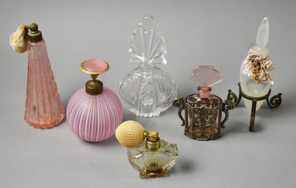 Mid Century Art Glass Perfume Bottles: These bottles include a pink ribbed Irice, a pink and white orb that appears to be Murano, an opalescent bottle with ornate base, pink with Art Deco style stopper with base that appears brass and othe