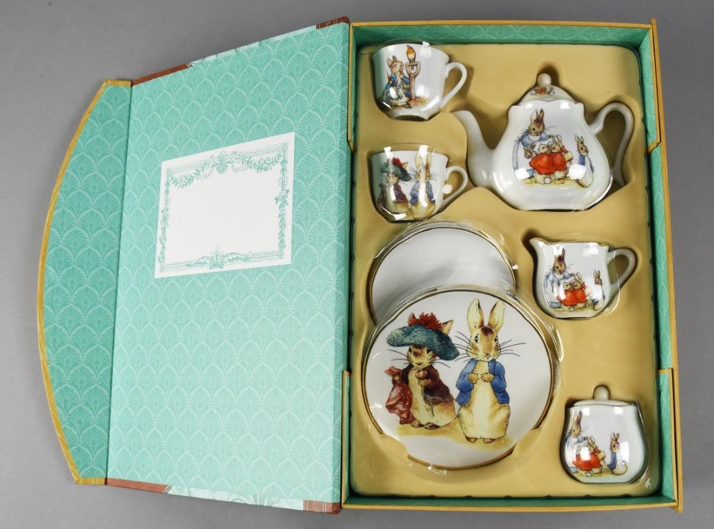 Reutter Porzellan Beatix Potter Child's Tea Set MIB: Adorable porcelain child's tea set in original box. It is from Reutter Porzellan for Beatrix Potter and includes two cups, saucers, plates, teapot, lidded sugar and cream pitcher.