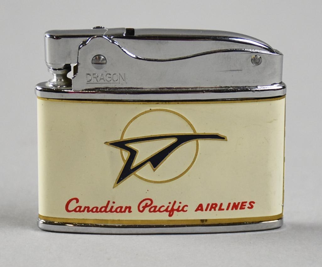 Vintage Canadian Pacific Airlines Dragon Lighter: Very cool vintage automatic super lighter, made in Japan. It is a Dragon with white enamel, the airline logo and Canadian Pacific Airlines in red with the back being plain. Canadian Pacific began oper