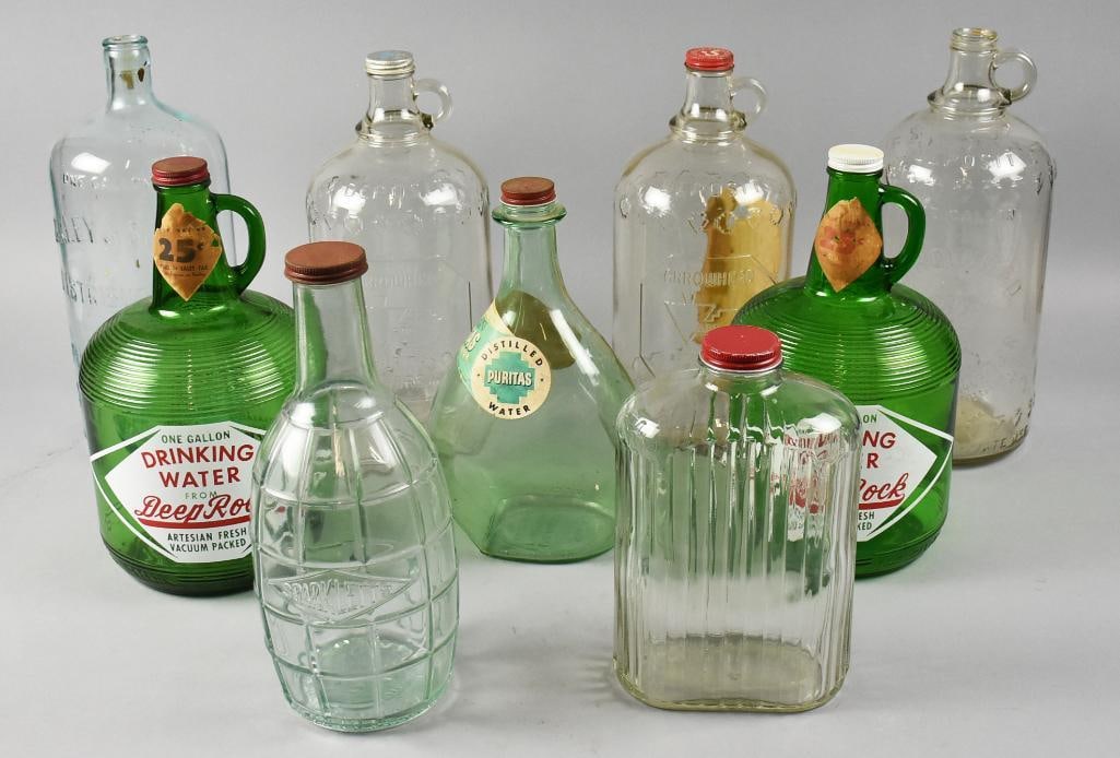 Vintage Advertising Glass Water Bottles and Jugs: Lot is for some cool vintage water bottles and jugs that you could still use today. They are for companies like Sparkletts, Puritas, Deep Rock, Arrowhead and more. They are all approx. 10" to 14" tall