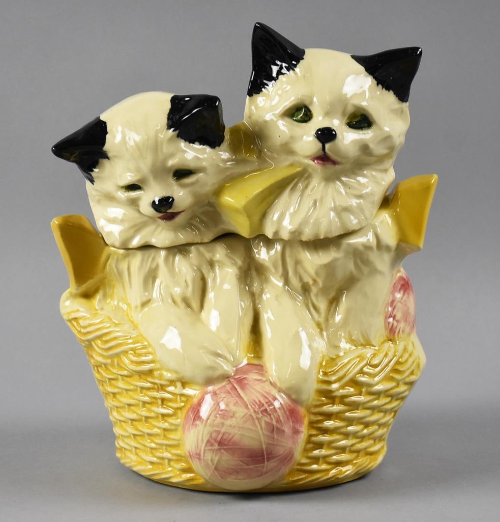 Vintage McCoy Kittens in a Basket Cookie Jar: Adorable vintage McCoy cookie jar. Pair of kittens in a basket with pink balls of yarn. McCoy USA on bottom, stands approx. 10.5" tall.