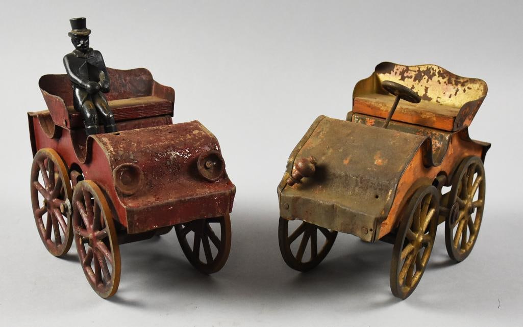 1903 DP Clark Hill Climber Friction Toys: Great pair of Hill Climbers from D.P. Clark made in 1903. Each Hill Climber appears to be both wood and tin with cast iron wheels, steering wheel and driver.?